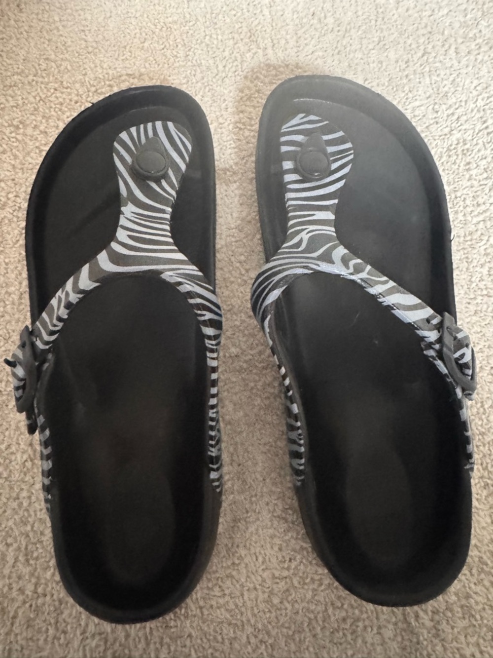 Black Zebra-Print Thong Sandals - Women